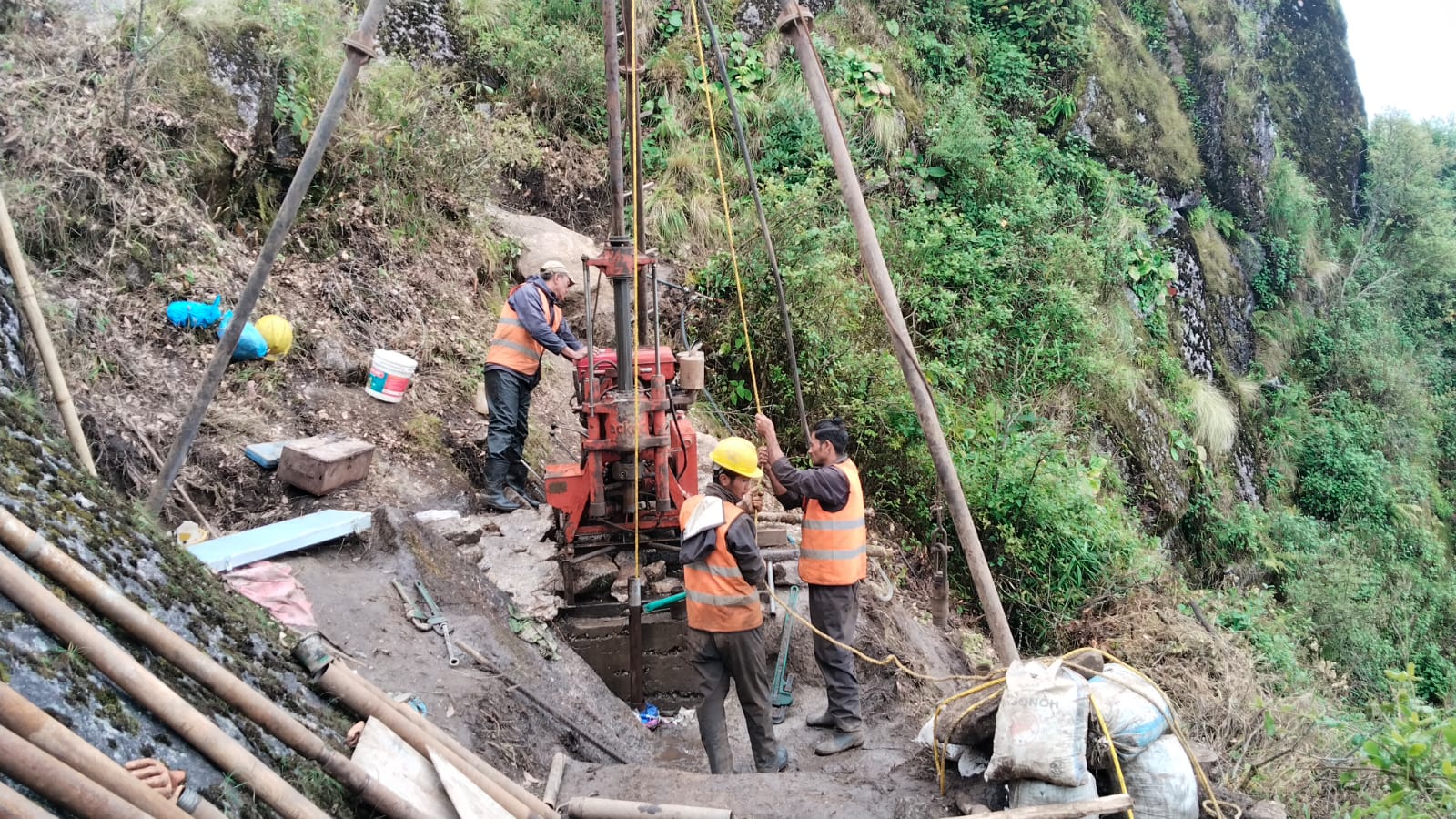 Core box showing granite sample interval from 55 to 60 meters