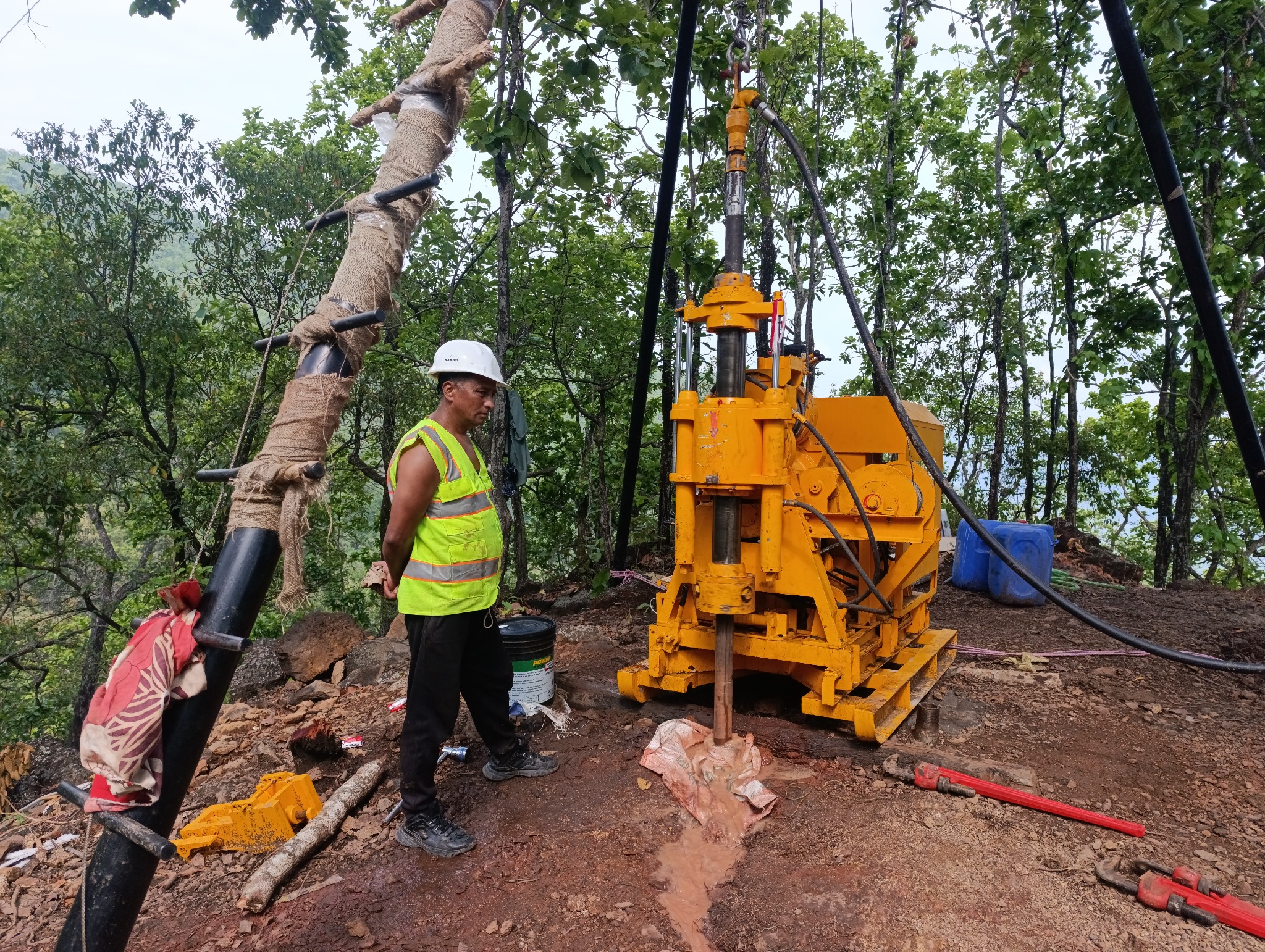Exploration drill rig operating within the Pharparbari project area